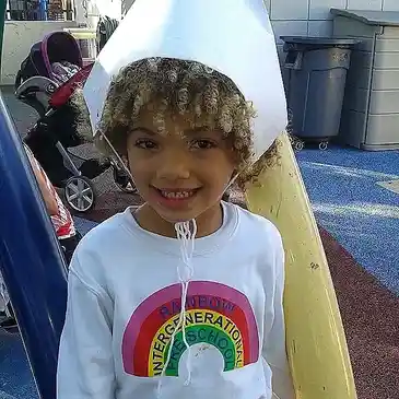 Young child in a playful outdoor setting