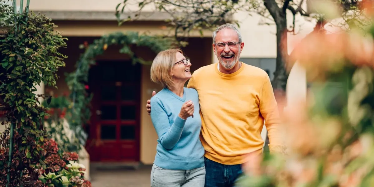 Happy senior couple walking together