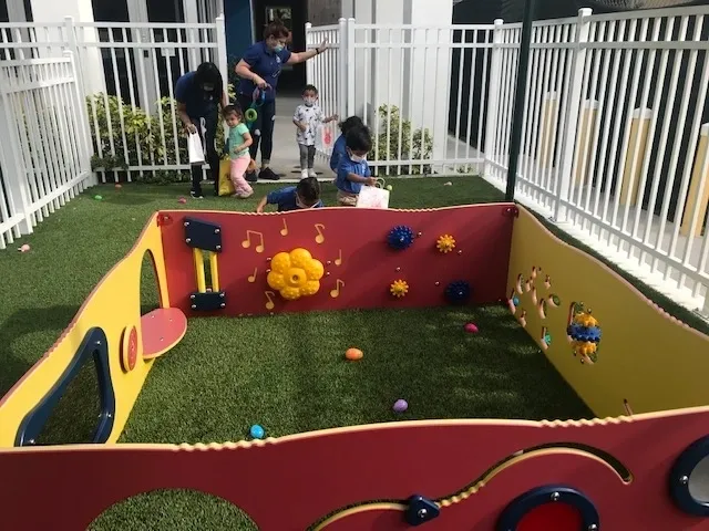 Outdoor playtime with colorful playpen